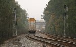 ETTX 716057 at the tail end of a line of auto racks at the Peachtree City signals